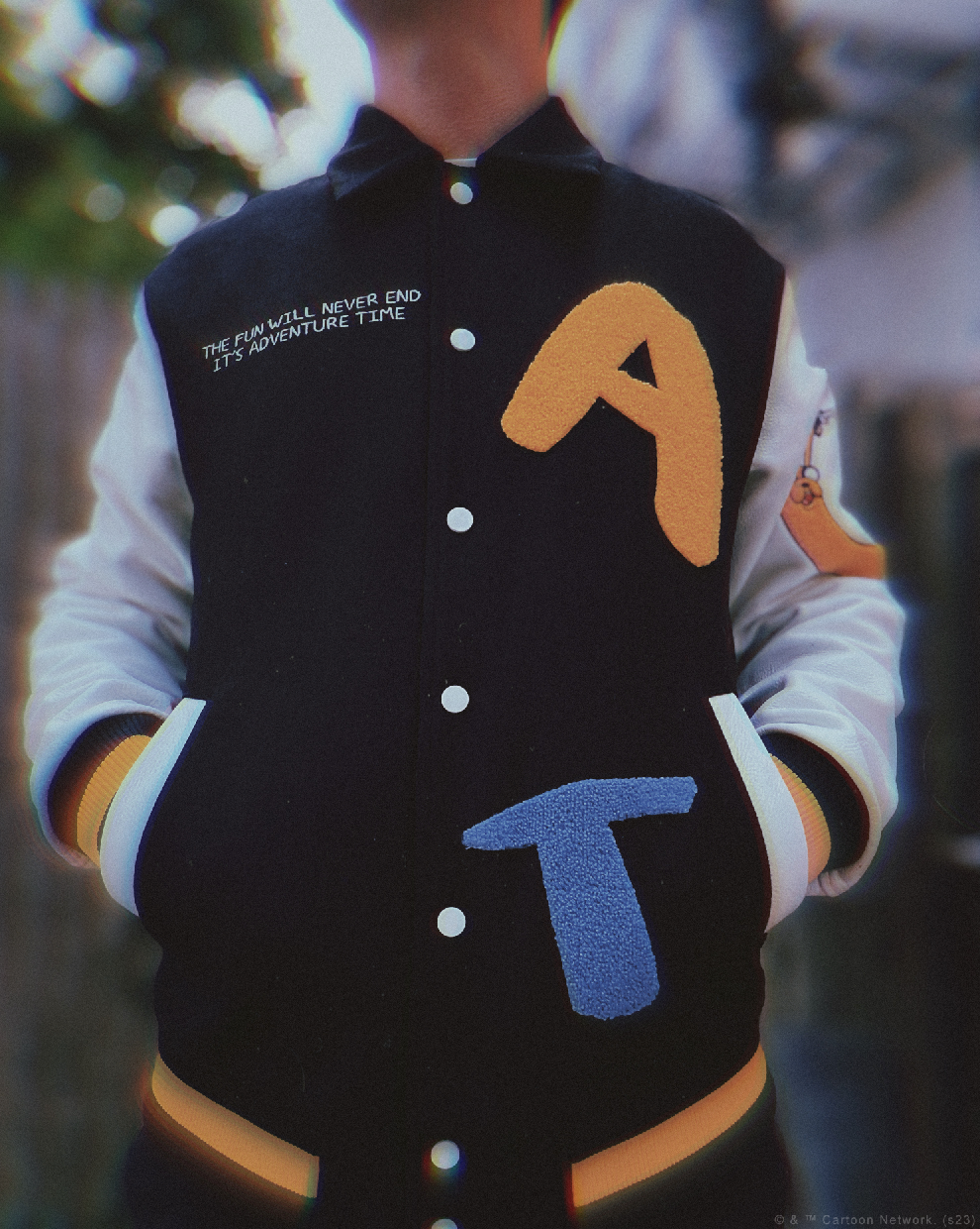 Original Collectors Edition varsity jacket worn outdoors, showing yellow A and blue T chenille chest patches